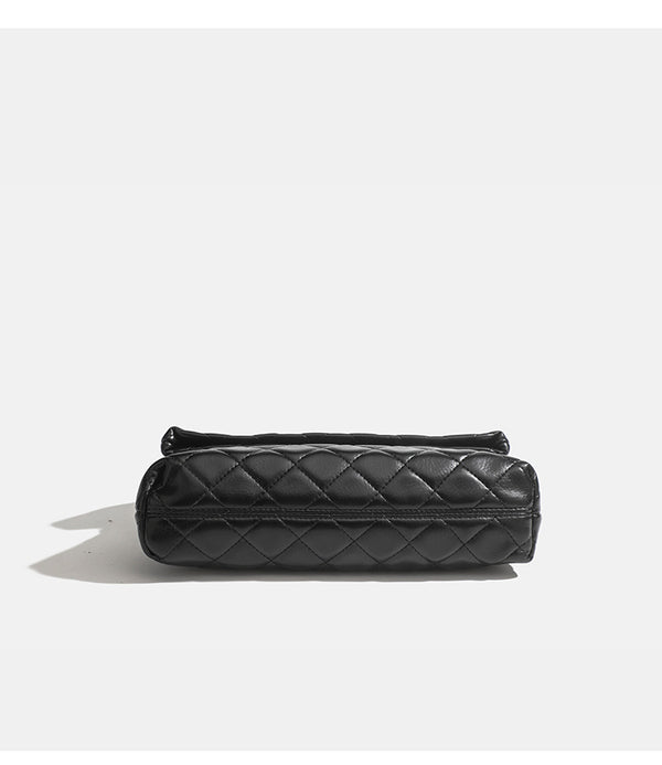 Quilted diamond-stitch flap crossbody bag with gunmetal chain strap and cut-out bar handle, detail view 12