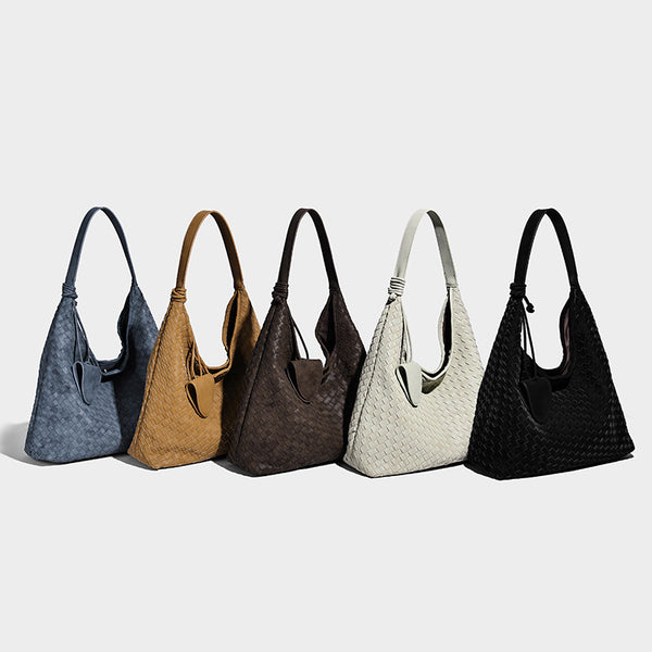 Slouchy woven hobo shoulder bag with knotted strap and matte leather-look textured finish, detail view 2