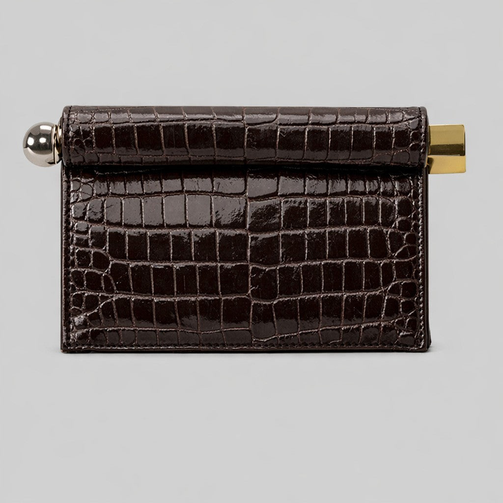 Structured rectangular clutch bag with rolled-top bar closure, gold-tone and silver-tone mixed metal hardware, detail view 11