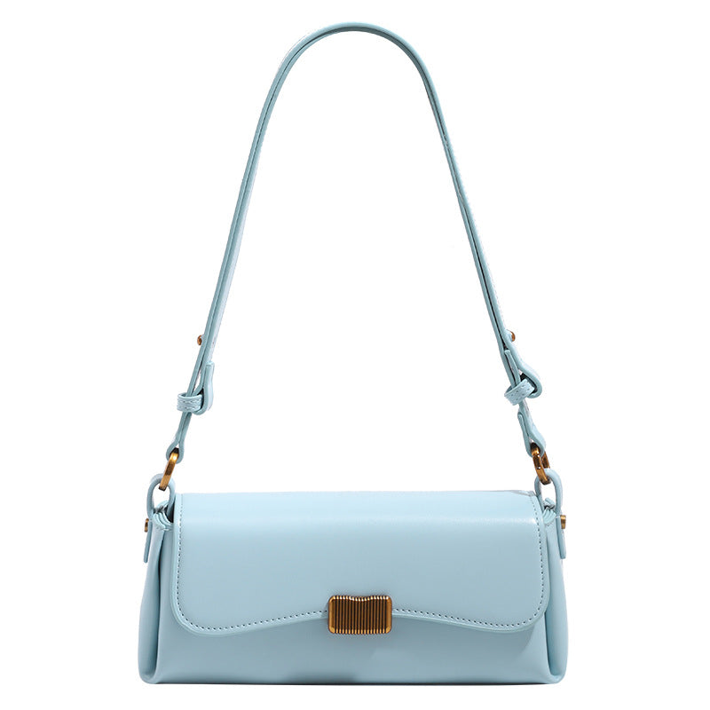 Structured rectangular baguette shoulder bag in pastel sky blue with smooth leather-look finish, ribbed gold-tone turn-lock