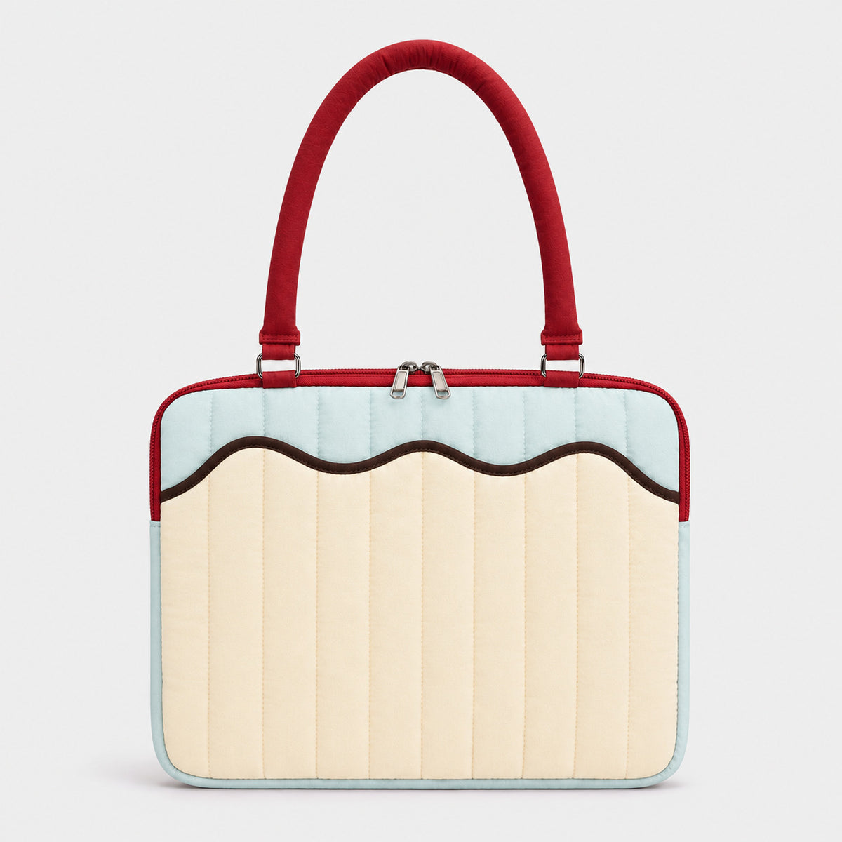 Quilted colorblock handbag with wavy scalloped front panel, padded arched top handles, and dual zip closure, detail view 8