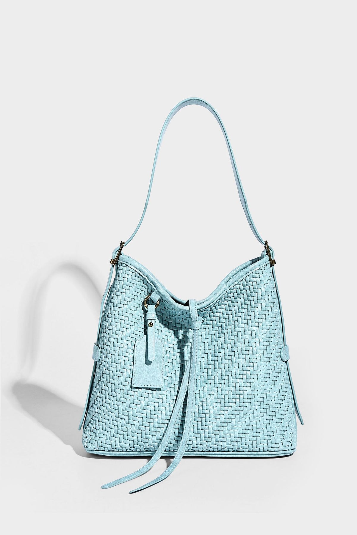 Slouchy woven-texture bucket shoulder bag with tassel tie closure and gold-tone hardware, detail view 32