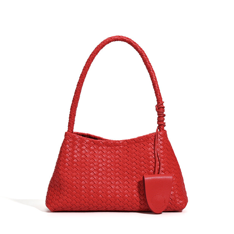 Woven leather-look shoulder bag with braided strap, trapezoidal body, and matching zip pouch, detail view 5