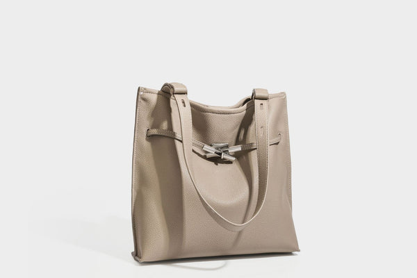 Pebbled leather-look tote bag with front toggle hardware and long shoulder strap, detail view 25