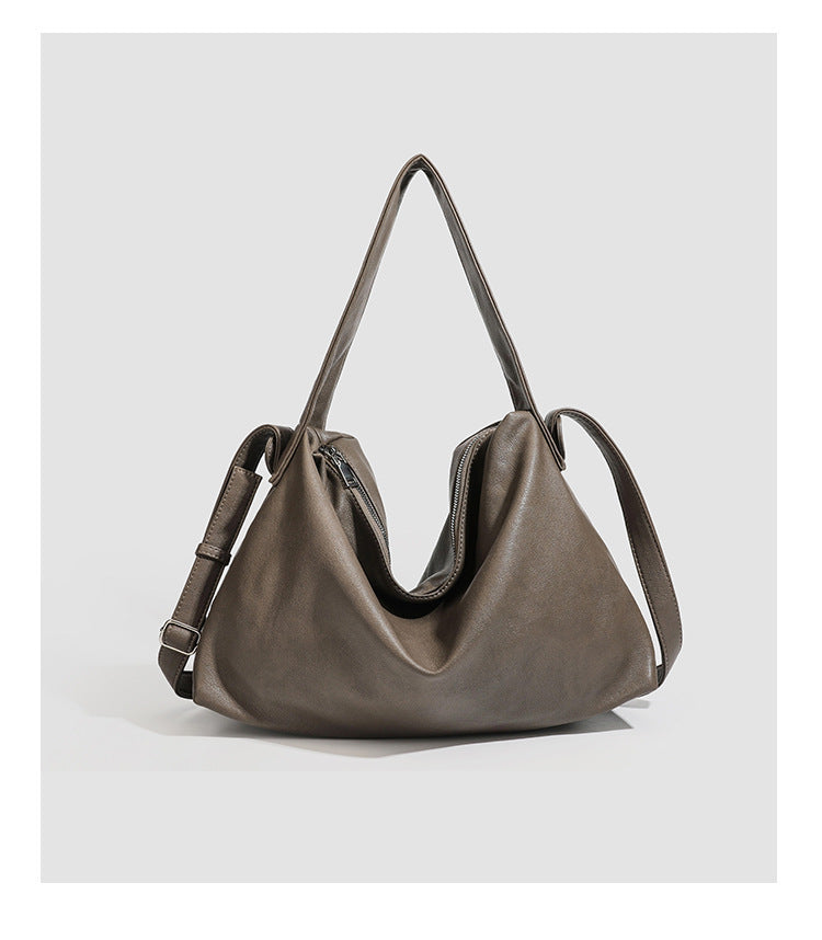 Slouchy leather-look hobo shoulder bag with top zipper and silver-tone hardware, detail view 23