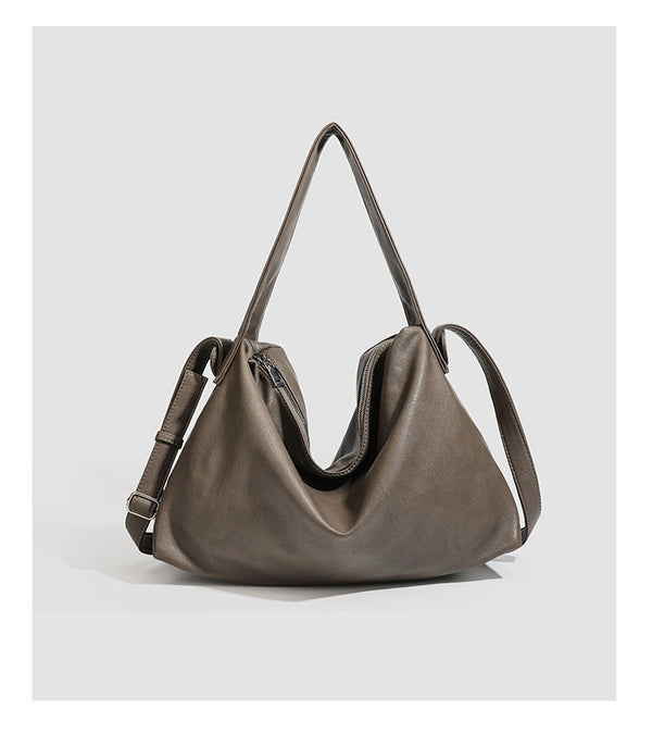 Slouchy leather-look hobo shoulder bag with top zipper and silver-tone hardware, detail view 23