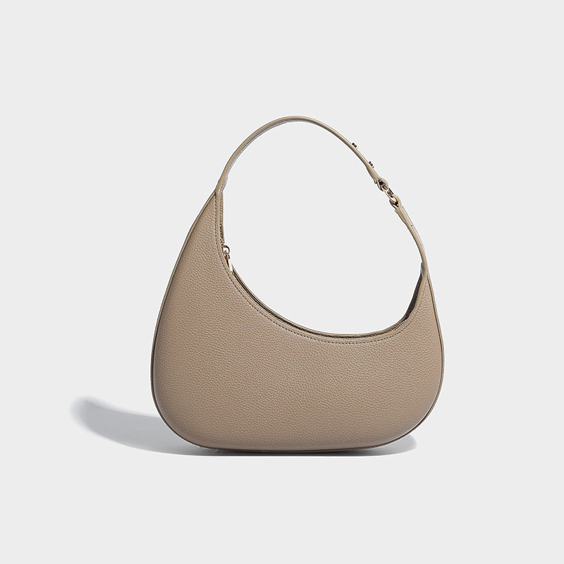 Halbmond-Schultertasche mit genarbter Oberfläche, einem Schlaufenhenkel und goldfarbenen Reißverschlussbeschlägen, Detailansicht 7