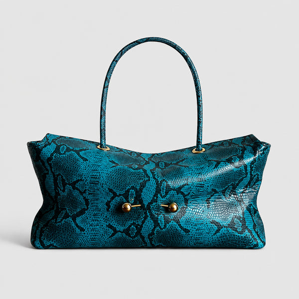 Wide embossed-texture shoulder tote bag with single loop handle and gold-tone toggle hardware, detail view 25