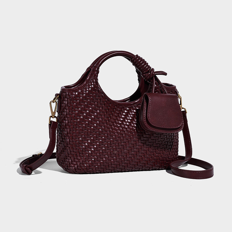 Woven texture tote bag with knotted top handles, attached front mini pouch, and gold-tone hardware, detail view 10