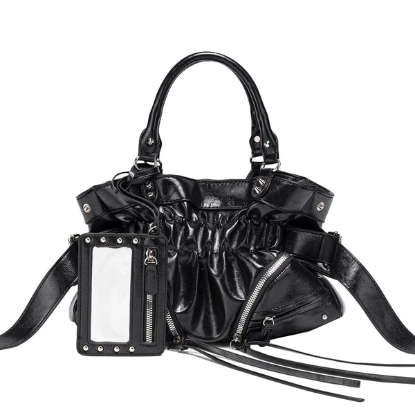 Black glossy ruched convertible tote bag with silver-tone rivets, detachable wide shoulder strap, external zip pouch, and