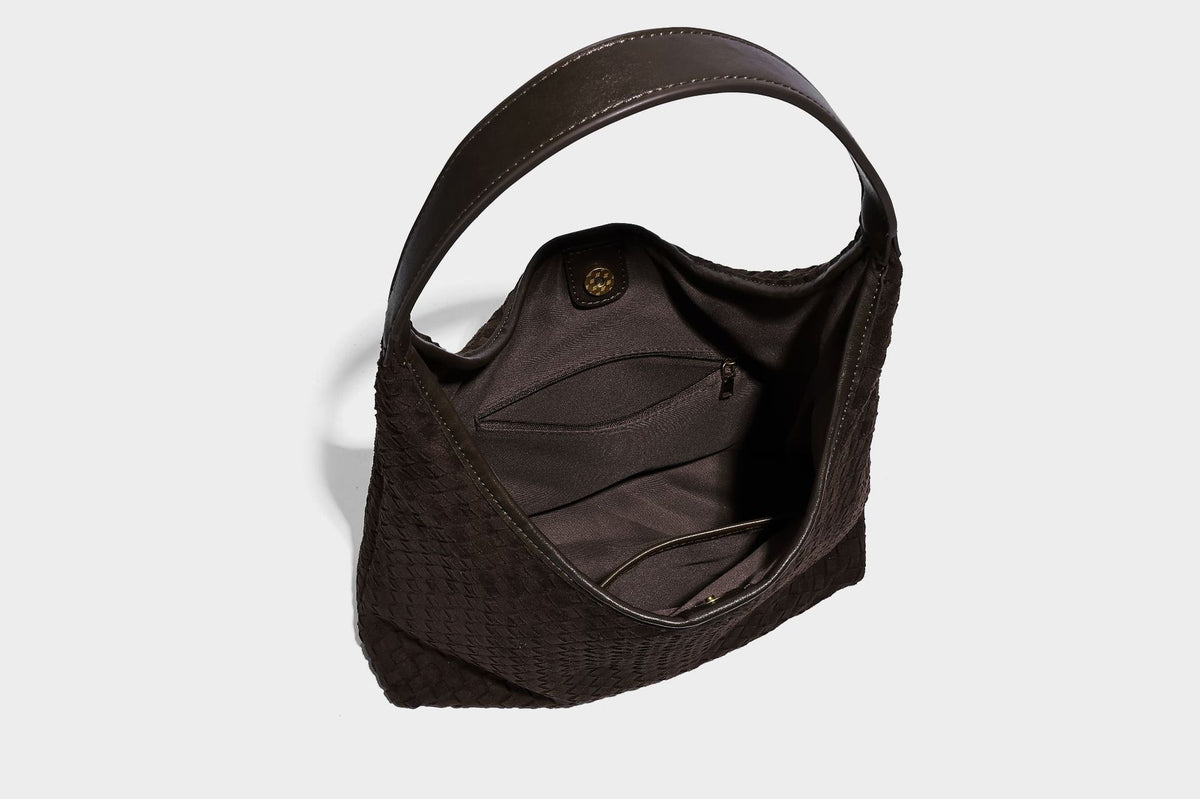 Large slouchy woven hobo tote bag with curved shoulder strap and triangular silhouette, detail view 22