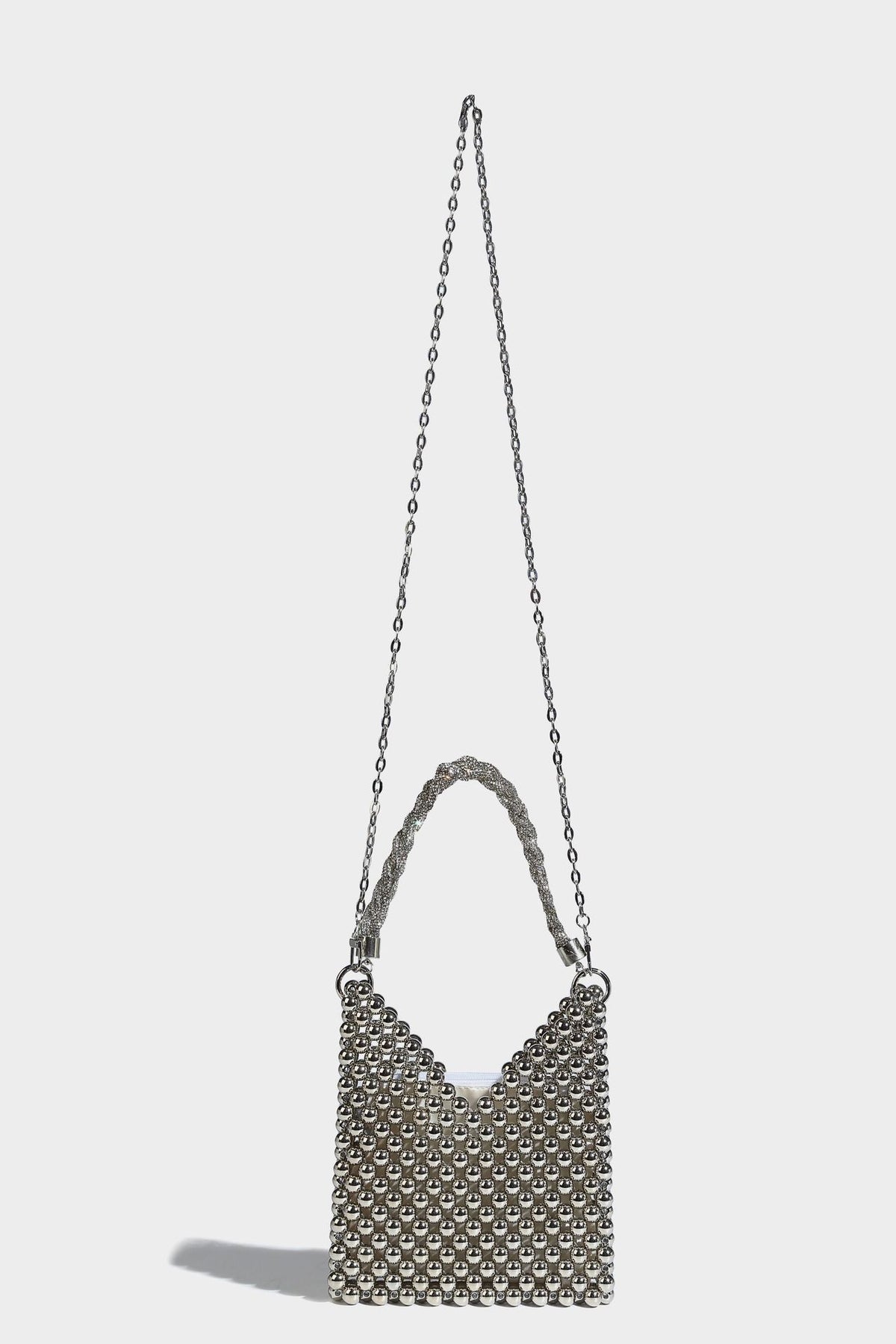Small silver metallic beaded mini bag with braided rhinestone top handle and detachable chain crossbody strap, detail view 23