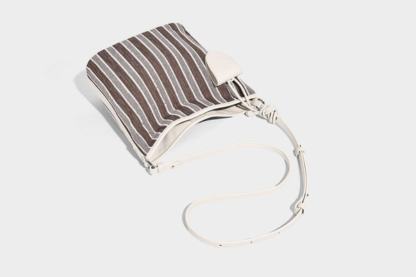 Large striped canvas hobo shoulder bag with cream trim and silver-tone hardware, detail view 21