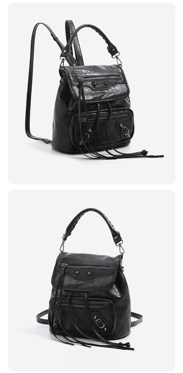 Mini flap backpack handbag with silver stud hardware, front zip pockets, and drawstring tassels, detail view 11