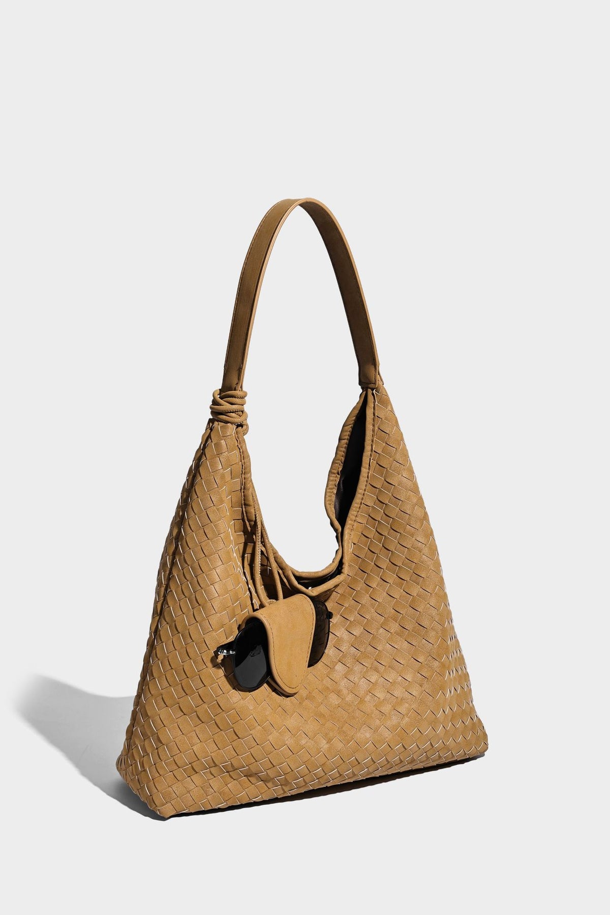 Slouchy woven hobo shoulder bag with knotted strap and matte leather-look textured finish, detail view 31