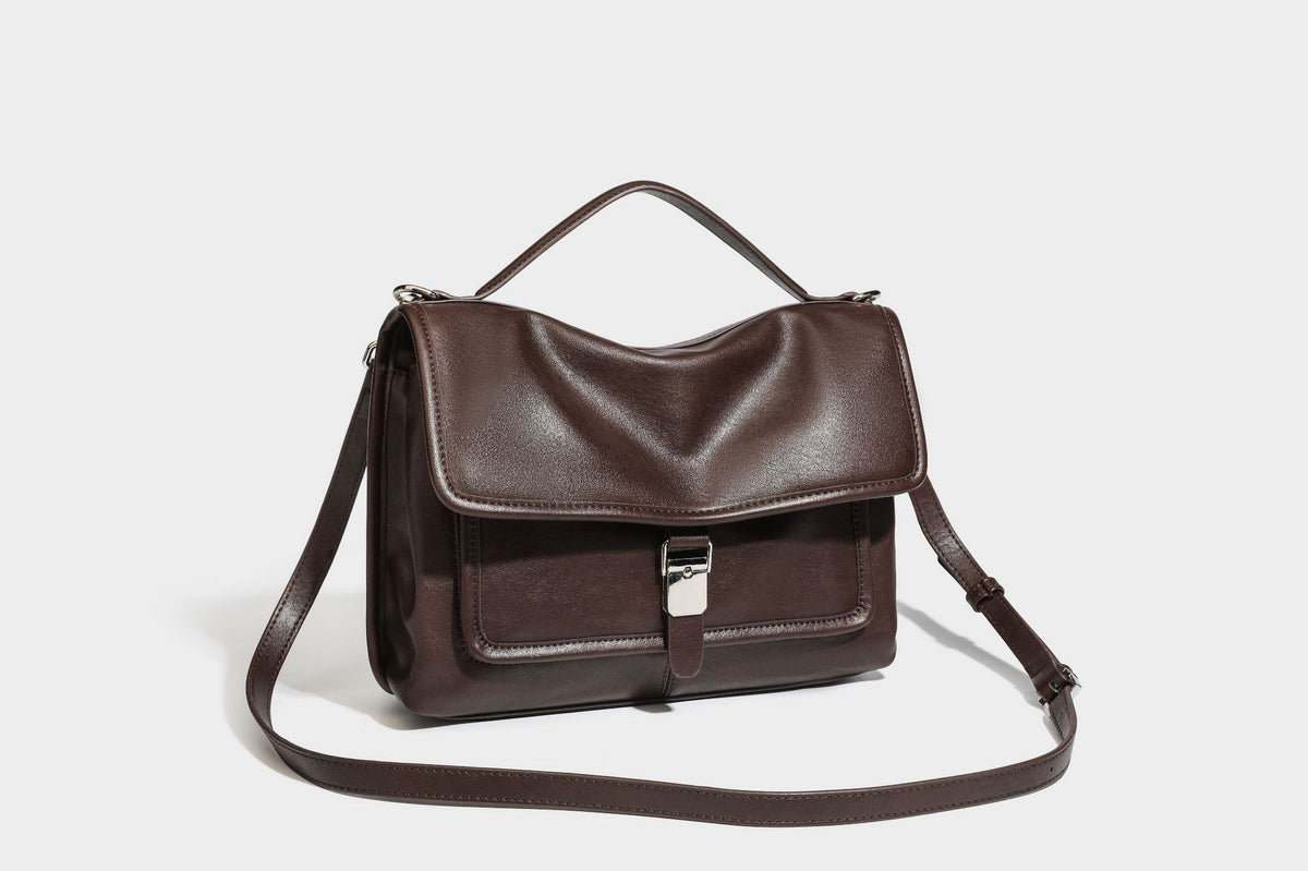 Structured rectangular satchel bag in dark espresso brown with smooth leather-look finish, flap front with silver turn-lock