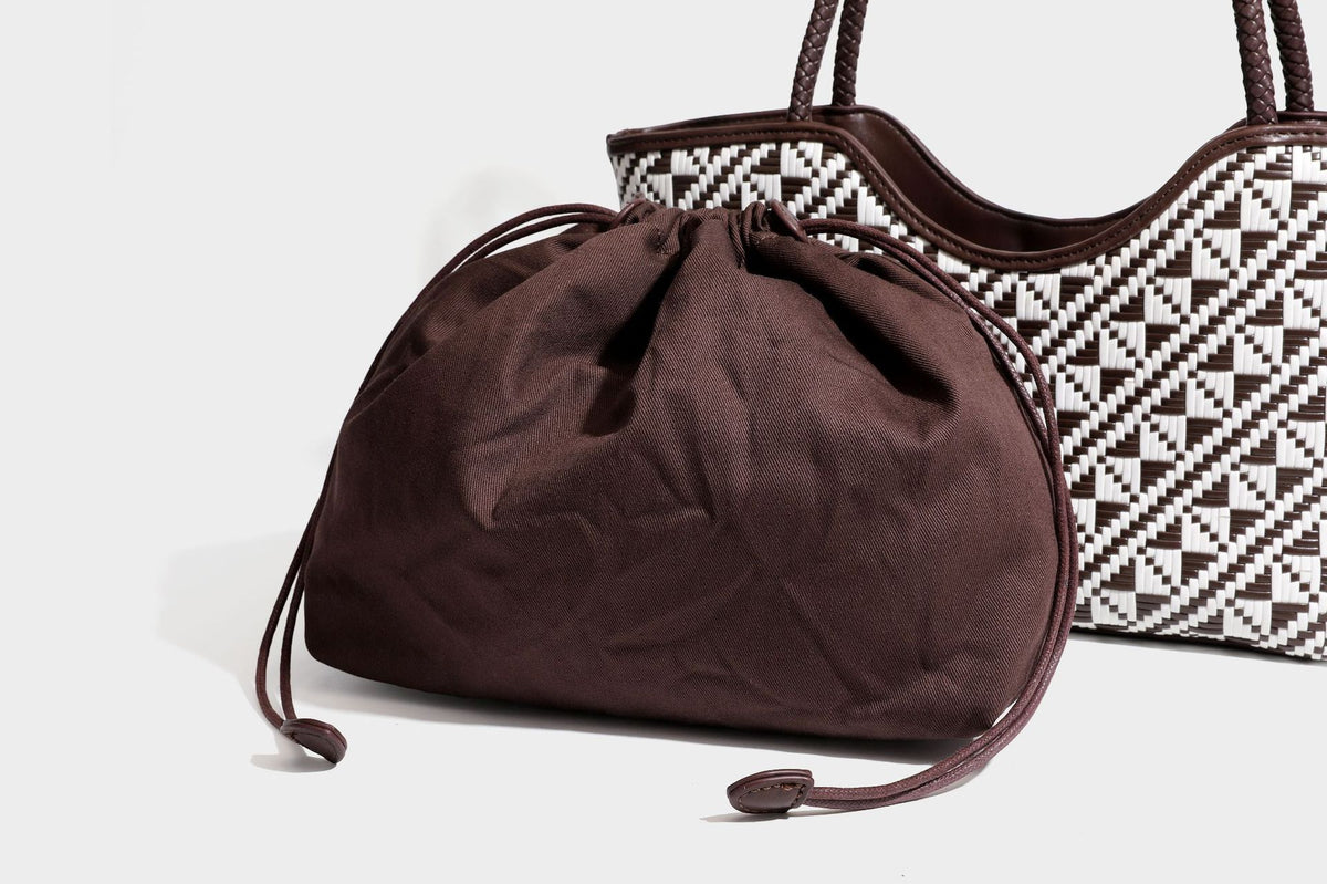 Woven geometric two-tone tote bag with braided shoulder straps and leather-look trim, detail view 40