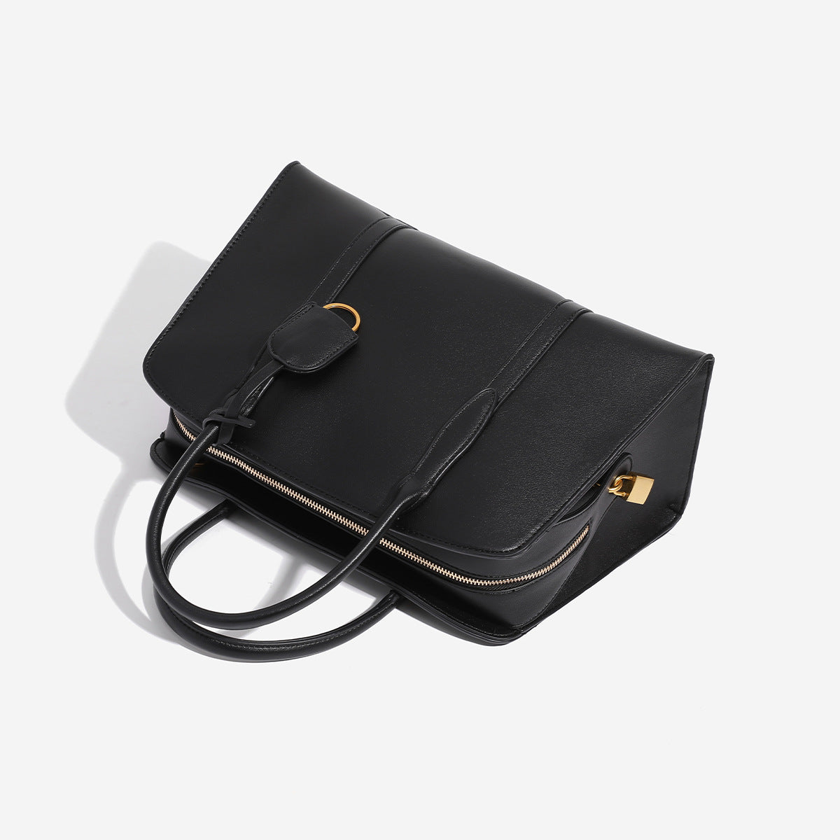 Structured retro Boston satchel bag with dual top handles, gold-tone ring hardware, and top zip closure, detail view 4