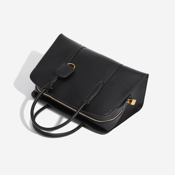 Structured retro Boston satchel bag with dual top handles, gold-tone ring hardware, and top zip closure, detail view 4