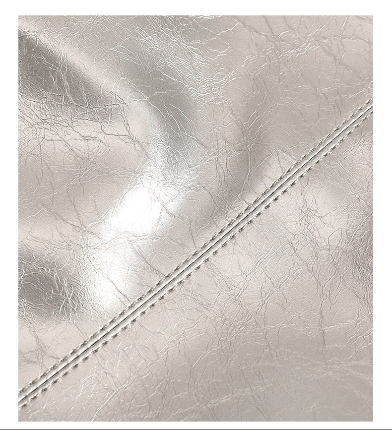 Large open-top shoulder tote bag with glossy crinkled metallic finish and long double straps, detail view 13