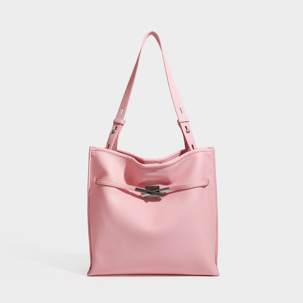 Large structured tote bag in pebbled leather-look finish with silver-tone twist-knot front detail and adjustable shoulder