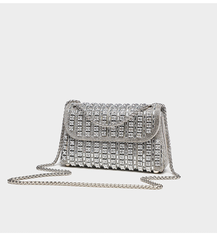 Structured mini flap crossbody bag covered in grid-set rhinestones with silver-tone chain strap, detail view 7