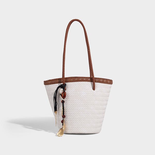 Chevron-woven bucket tote bag with braided shoulder straps and matching drawstring pouch, detail view 13