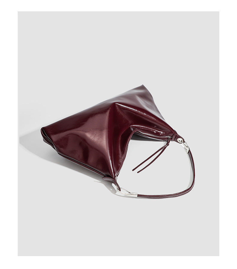 Glossy structured shoulder tote bag with silver-tone hardware and top zip closure, detail view 8