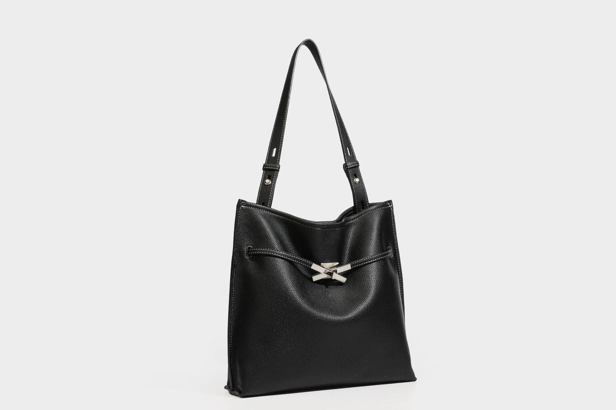 Pebbled leather-look tote bag with front toggle hardware and long shoulder strap, detail view 40