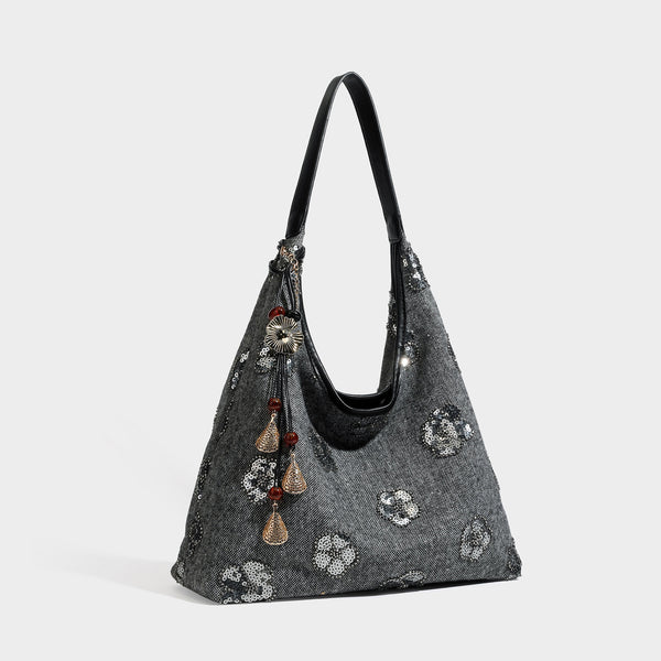 Lässige Trapez-Schulter-Tote in Anthrazit mit floralen Motiven aus silberfarbenen Pailletten, Trageriemen in Lederoptik und herabhängendem, perlenverziertem