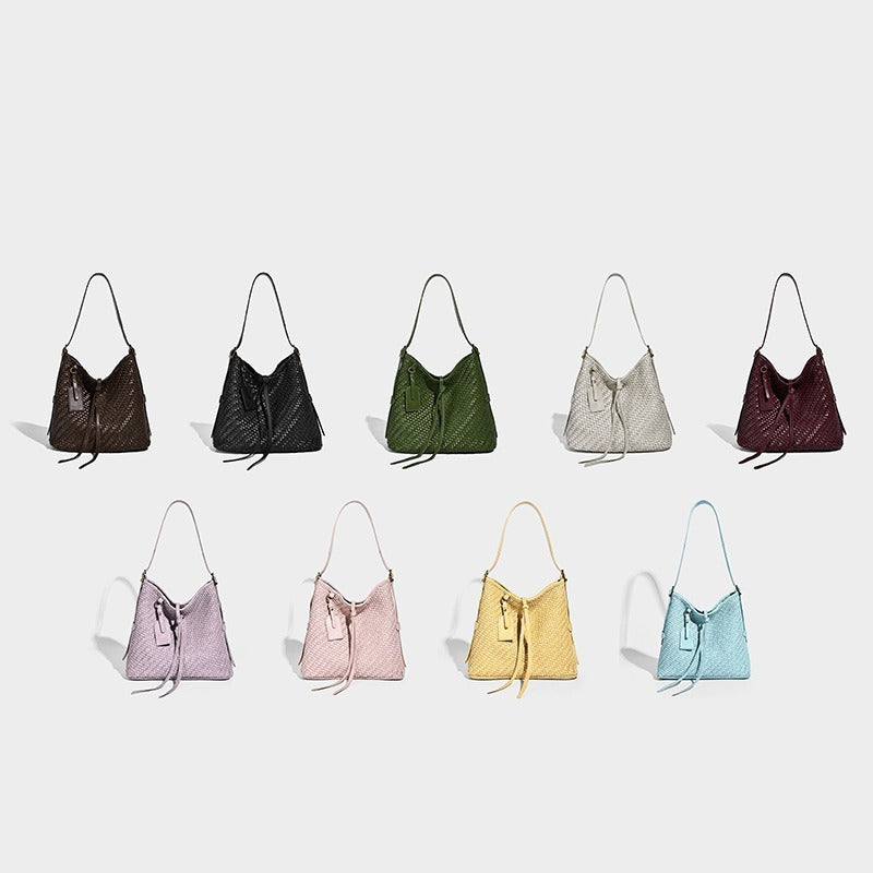 Slouchy woven-texture bucket shoulder bag with tassel tie closure and gold-tone hardware, detail view 2