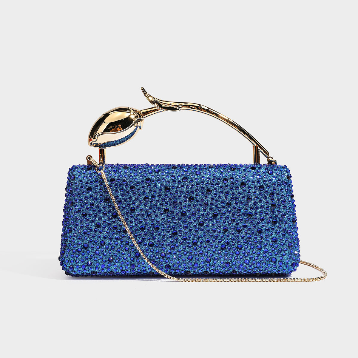 rectangular hard-case rhinestone evening clutch with sculptural gold-tone branch-and-bud top handle and detachable chain