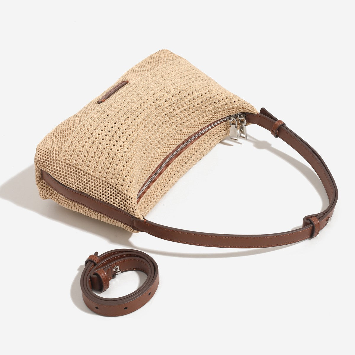 Woven crescent hobo shoulder bag with adjustable leather-look strap and top zip closure, detail view 3