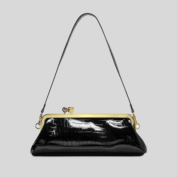 Strukturierte Clutch mit Kiss-Lock-Rahmenverschluss aus dunkelbrauner, krokodil-geprägter Lederoptik mit goldfarbenen Details und schmalem