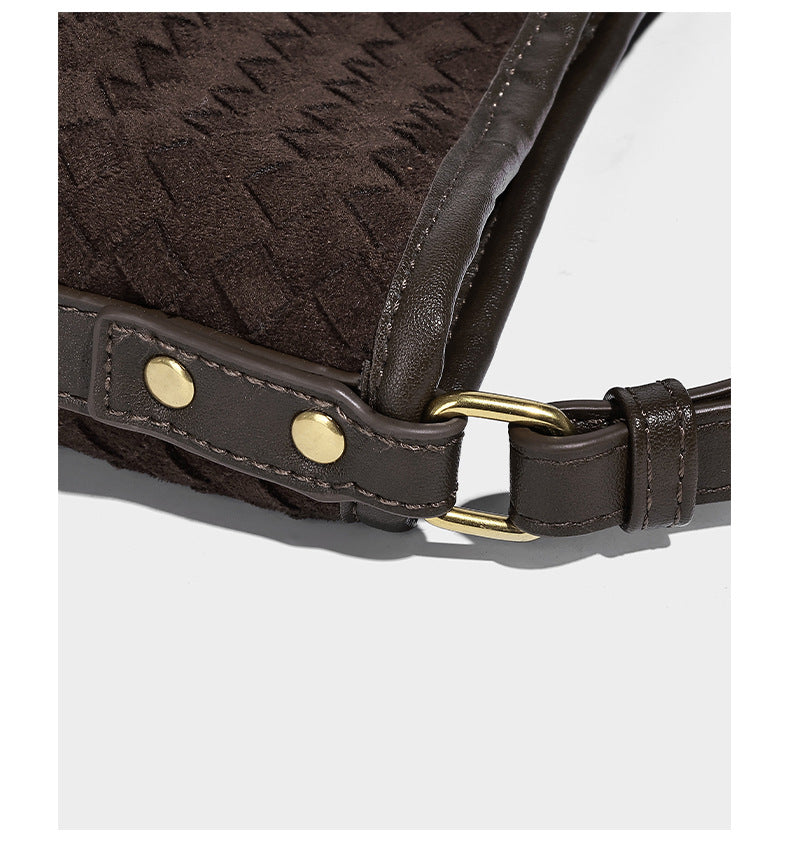 Dark chocolate woven texture hobo shoulder bag with multicolor tassel-and-bead charm and long adjustable strap, detail view