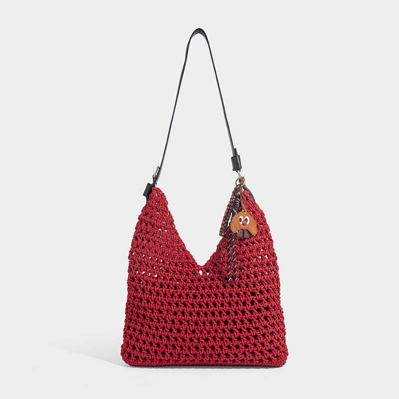 Slouchy open-knit crochet hobo tote bag with leather-look top handle and metal buckle hardware, detail view 8