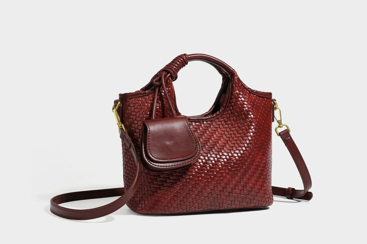 Woven leather-look tote bag in mocha brown with knotted top handle, front flap pocket, and detachable crossbody strap with