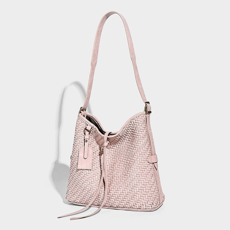 Slouchy woven-texture bucket shoulder bag with tassel tie closure and gold-tone hardware, detail view 4