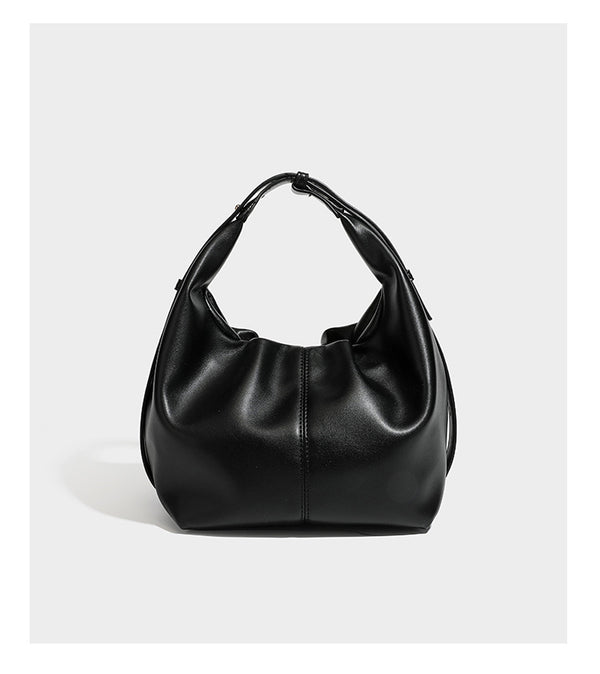 Slouchy hobo bag with smooth leather-look finish, drawstring cinch closure, and gold-tone bead hardware, detail view 10