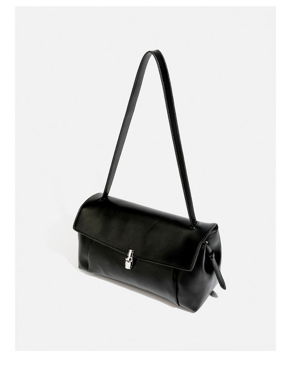 Structured rectangular flap shoulder bag with smooth leather-look finish, silver-tone turn-lock clasp, and long slim