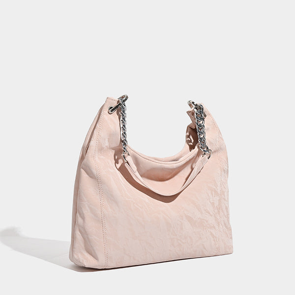 Large embossed leather-look shoulder tote bag with silver-tone chain strap, detail view 3