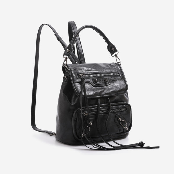 Mini flap backpack handbag with silver stud hardware, front zip pockets, and drawstring tassels, detail view 3