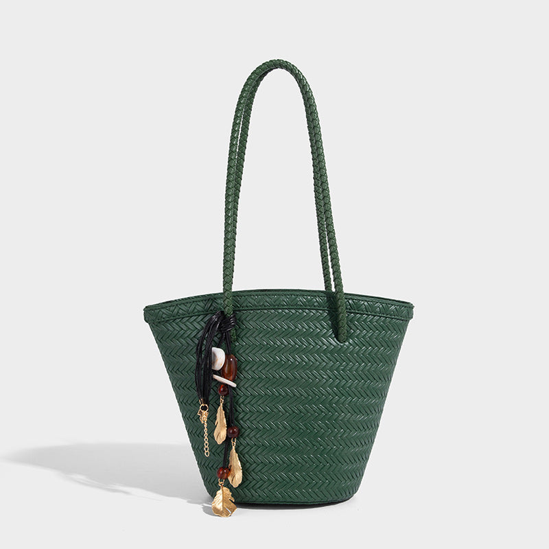 Chevron-woven bucket tote bag with braided shoulder straps and matching drawstring pouch, detail view 11