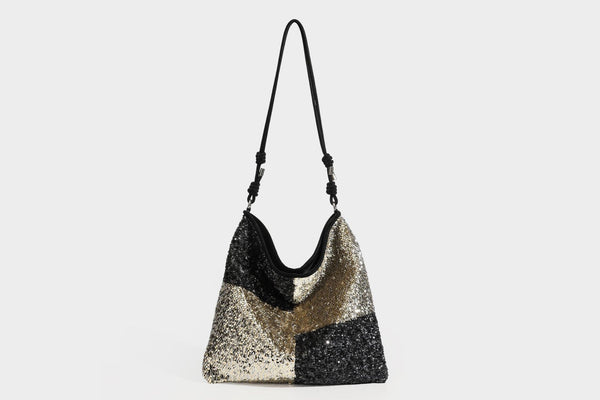 Lässig-weicher Patchwork-Schultershopper mit Pailletten, schwarz-goldenen oder creme-silbernen Colorblocking-Einsätzen und verstellbarem, schmalem Riemen