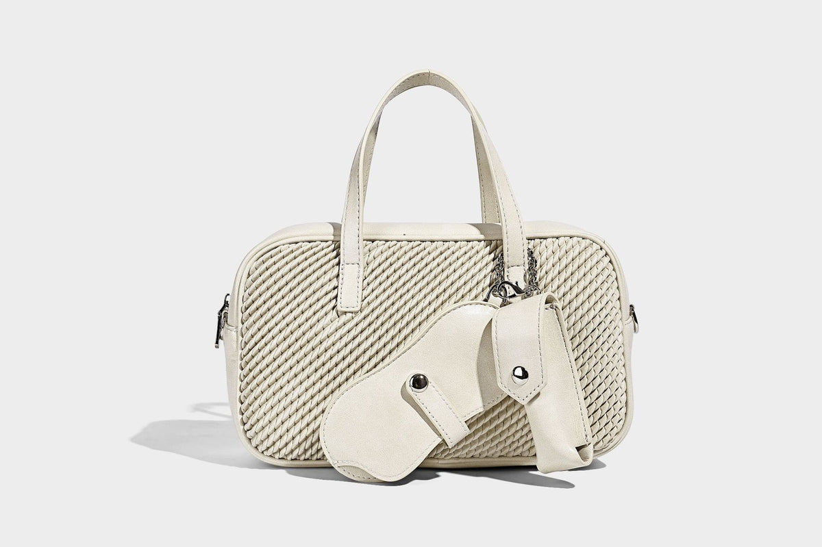 Structured woven-texture front top-handle handbag with zip closure, dual handles, detachable shoulder strap, and matching