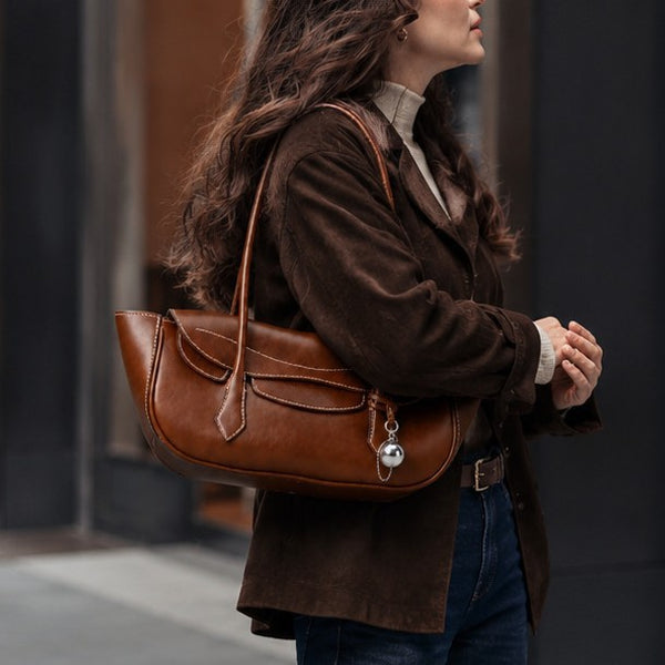 Structured leather-look flap shoulder bag with contrast stitching and silver ball charm hardware, detail view 3