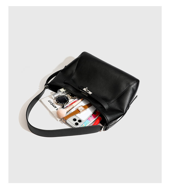 Large black pebbled leather-look hobo shoulder bag with silver-tone turn-lock front hardware and single flat adjustable