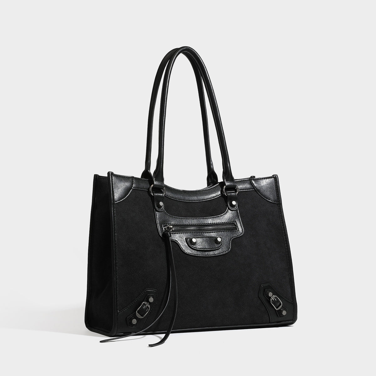 Large structured tote bag with matte suede-like body, smooth leather-look trim, front zip pocket, stud hardware, and