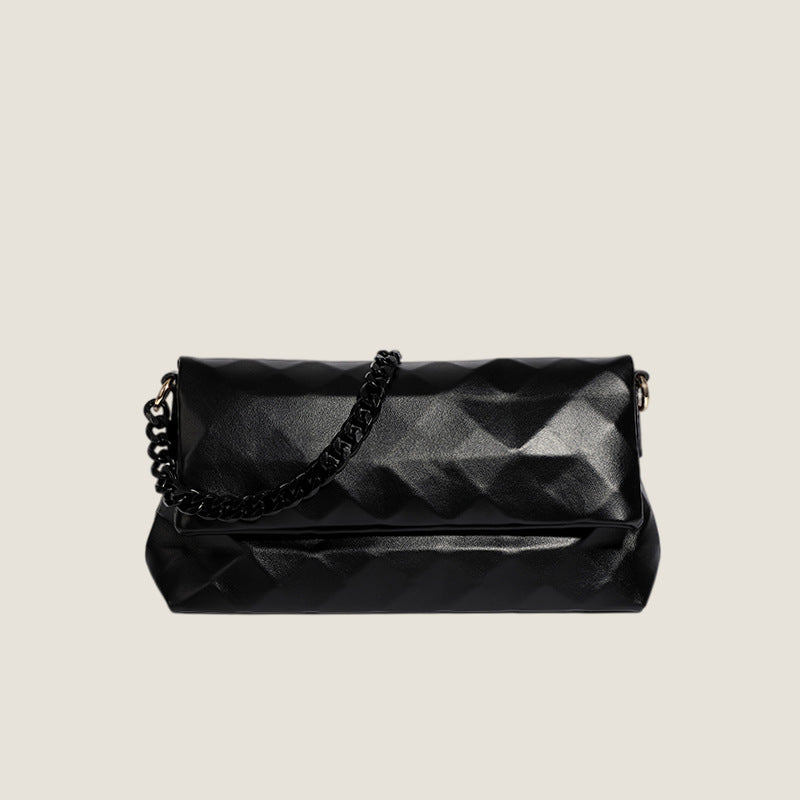 Cream white rectangular flap shoulder bag with geometric faceted surface and chunky tone-on-tone chain strap with gold-tone