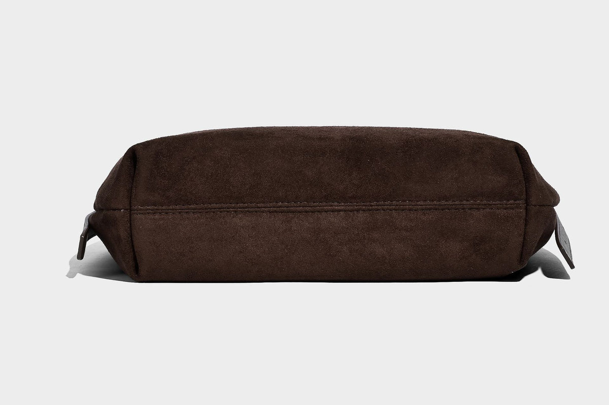 Slouchy crescent hobo shoulder bag in dark chocolate matte suede-look finish with adjustable strap and twin-pull top zip
